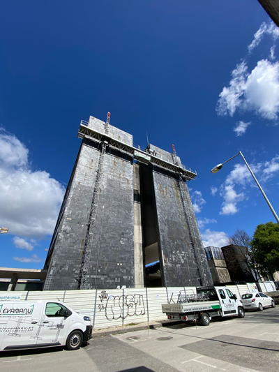 Elevador bimastro